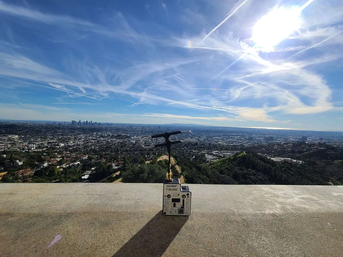 A node set down on a concrete overlook, with the Los Angeles basin behind it